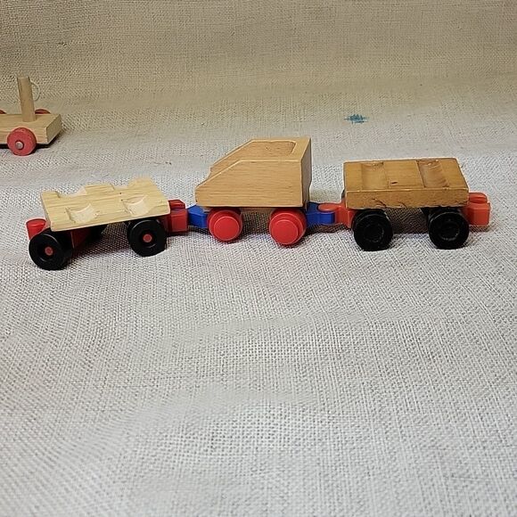Assorted small wood vehicles..train, dumo truck, race cars... - Picture 3 of 8